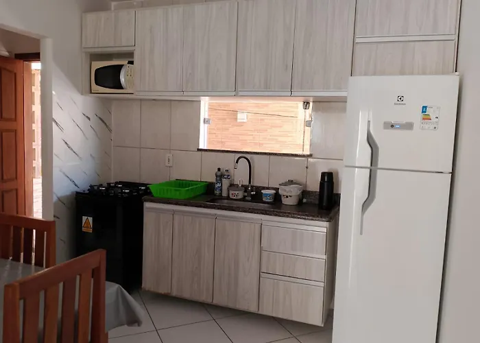 Hotel de praia: Apto Condomínio Recanto das Flores Taperapuã